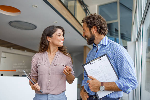 istock Business colleagues having a conversation in modern office 2232581282