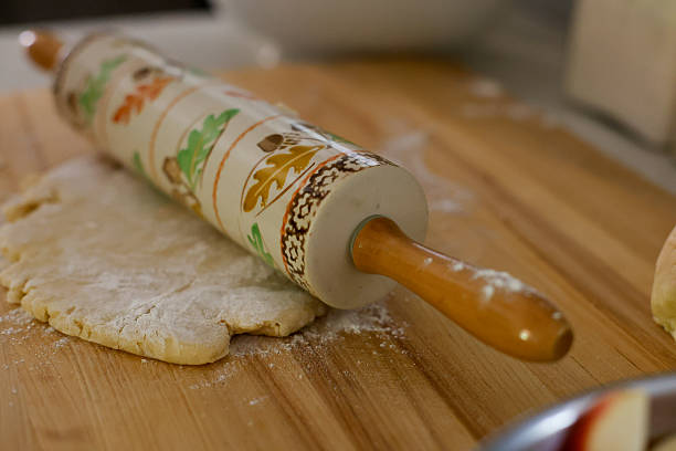 using cookie cutters and rolling pin