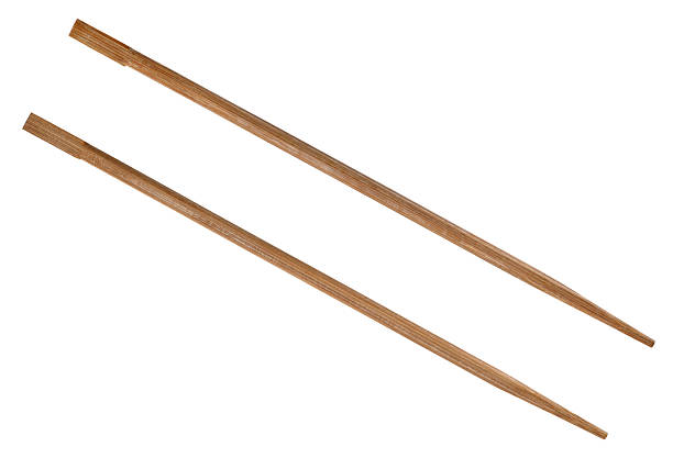 istock Bamboo wooden chopsticks isolated on a white background. 2232582056