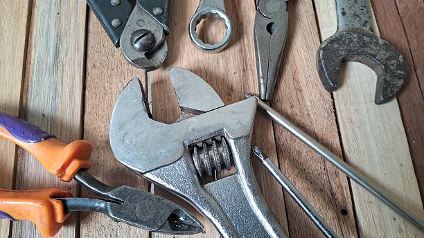 istock Assortment of Hand Tools on Wooden Surface 2232585259