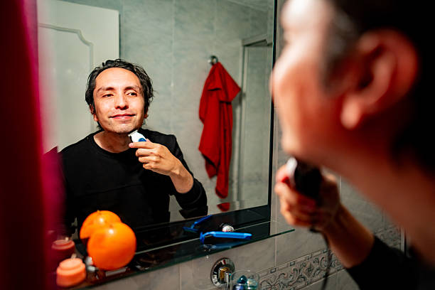 istock Mature man shaving at home bathroom 2232591753