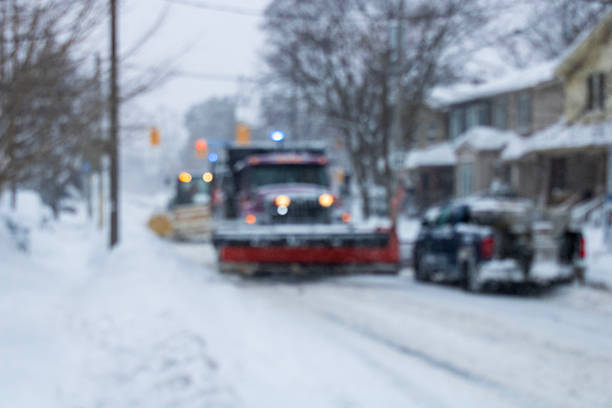 istock Snow removal during snowfall in the city 2232598838