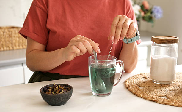istock Woman Making Blue Matcha Tea 2232599352