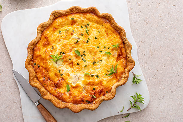 istock Salmon quiche freshly baked on a serving board, healthy breakfast idea 2232599916