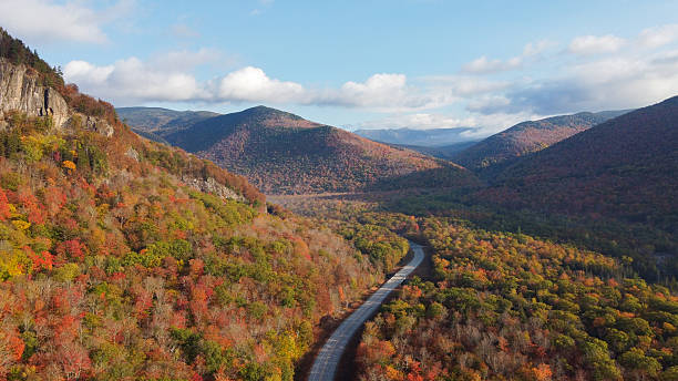 istock Highway Curves through New Hampshire Fall Foliage Landscape 2232607984