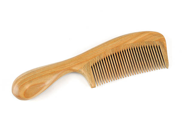 istock single wood comb isolated on white background 2232608972