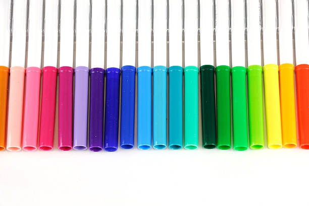 istock colorful markers in a row isolated on white background 2232609021