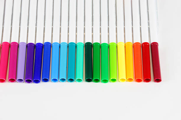 istock colorful markers in a row isolated on white background 2232609027