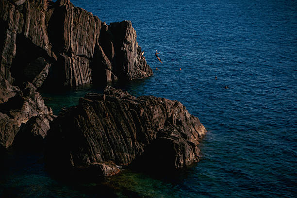 Professional images of Cinque Terre including beaches, boats, bikini lifestyle, colorful villages, coastal views, and Italian summer holidays