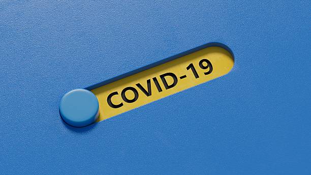 istock Covid-19.slide switch spelling.Flat lay view from above on blue background with slide switch buttons.IT technology concept.3D rendering on blue background. 2232611770
