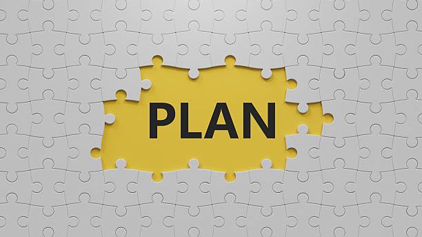 plan. The white puzzle pieces with missing pieces spelling.Flat lay view from above on The white puzzle pieces with missing pieces buttons.IT technology concept.3D rendering on yellow background.
