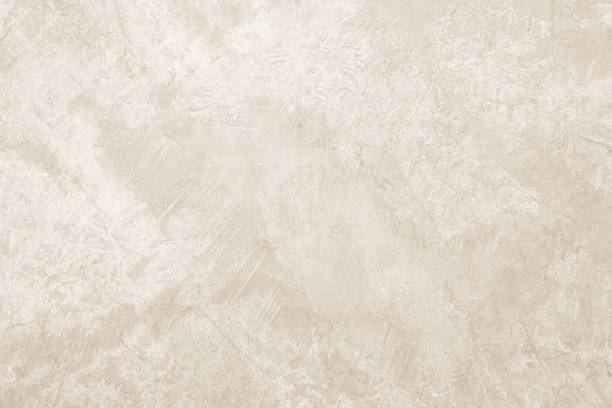 istock Concrete wall texture background. Close up retro plain cream color cement wall background texture. 2232616259