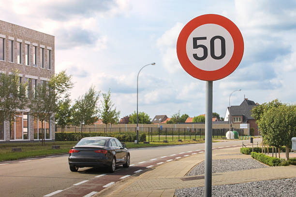 The speed limit sign is 50 kilometers per hour.
