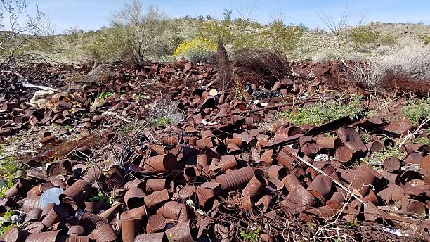 istock Can Dump at Old Mining Ghost Town, Pile of Rusty Cans in California Desert 2232618079