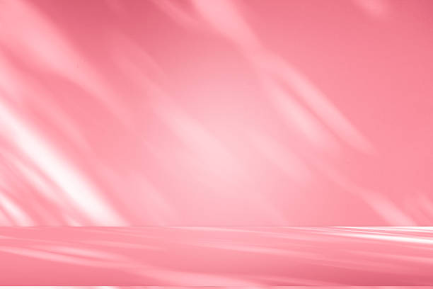 istock Wall interior background, studio, and backdrops show products. with shadow from window color white and pink light. background for text insertion and presentation of product 2232620215