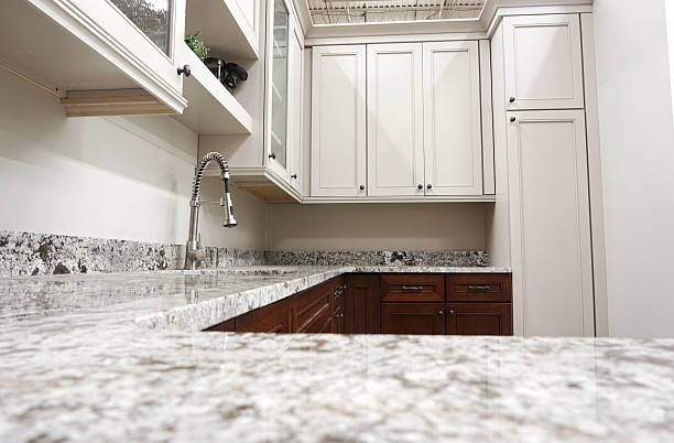 istock close up on kitchen countertop and wood cabinet 2232622885