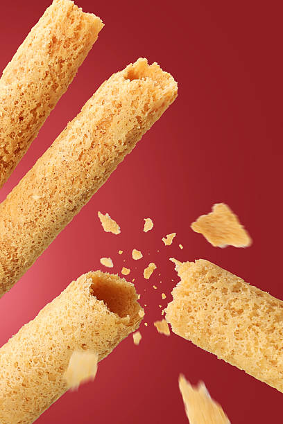Crispy baked egg roll snacks, puffed food and fried in studio shot
