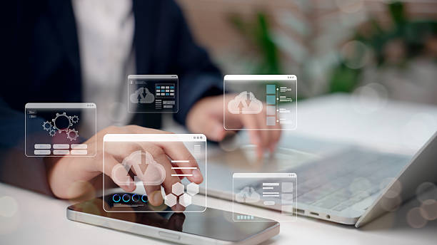istock Cloud technology and data storage concept with businessman using laptop and smartphone, digital cloud computing icons representing networking, online service, internet connection, and digital business. 2232627543