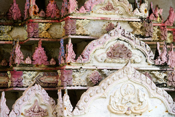 Explore the beauty of ancient architecture featuring intricate carvings in pink and white. This stunning artwork captures historical craftsmanship and spiritual essence.