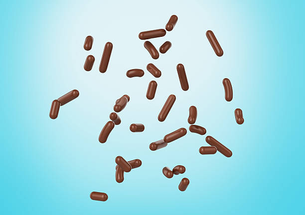 istock Chocolate Sprinkles For Cakes, Ice Cream And Desserts Falling On Blue Background 3D Illustration 2232628602