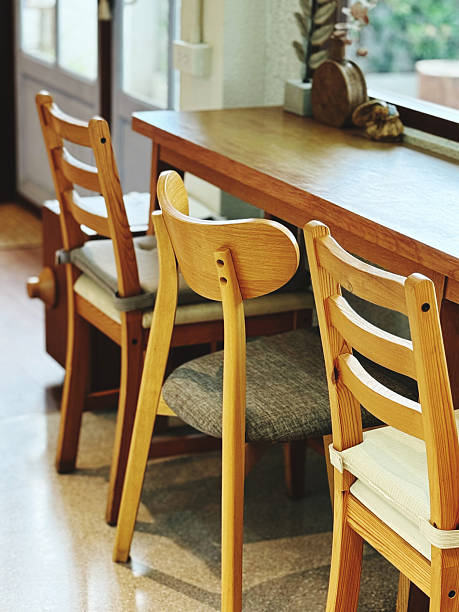 istock Wooden chairs and table in restaurant, vintage style. Selective focus. 2232631070
