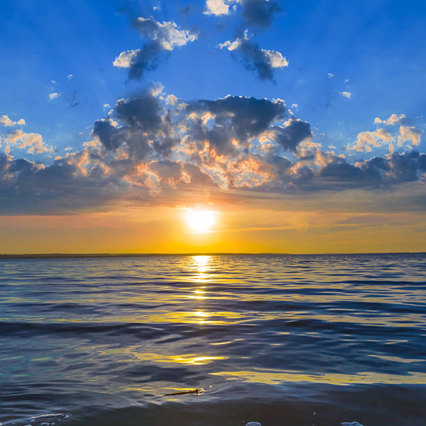 istock calm lake at the dramatic sunset 2232632903