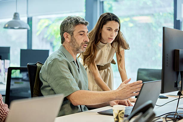 istock Business partners working on project in modern office 2232638736