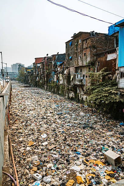istock Polluted Urban Stream With Plastic and Waste in Mumbai 2232639614