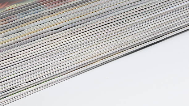 Stacked sheets of paper and low angle view for copy space.