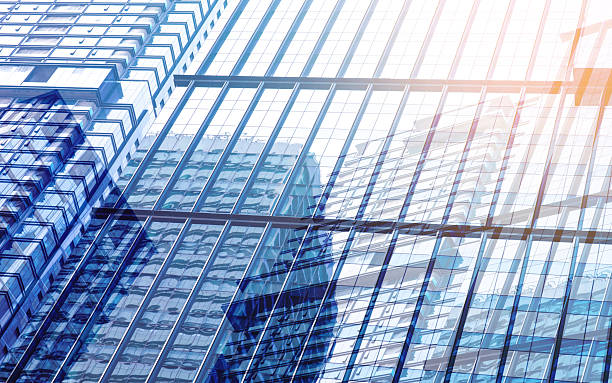 Low shot of visual dynamics of modern glass building background