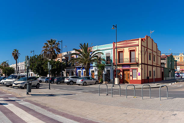 Valencia, Spain - March 31, 2025: A picture of a row of colorful houses in seaside Valencia.