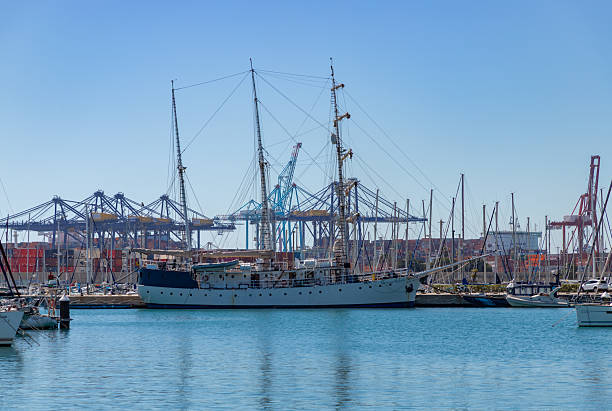 Valencia, Spain - March 31, 2025: A picture of the Cervantes Saavedra sailing vessel docked between the Valencia Marina and the Port of Valencia.