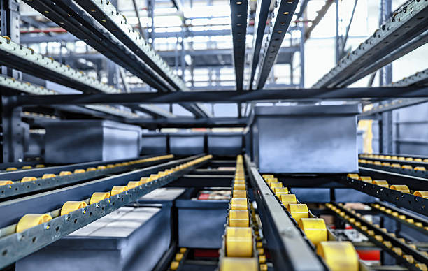 istock logistic warehouse. packing line in a logistics warehouse. conveyor belt in a modern production line 2232652670