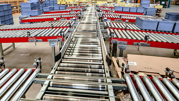 istock logistic warehouse. packing line in a logistics warehouse. conveyor belt in a modern production line 2232652676