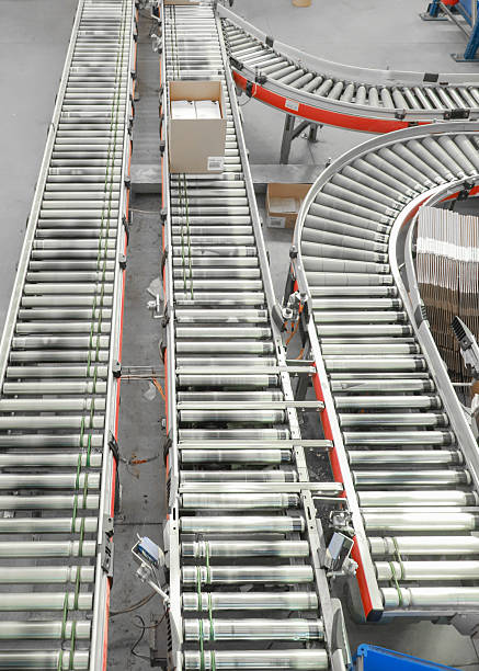 istock logistic warehouse. packing line in a logistics warehouse. conveyor belt in a modern production line 2232652698