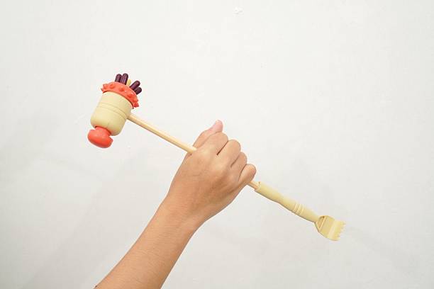 From above of wooden massager roller set for body massage tools used for muscle tension and skin health support