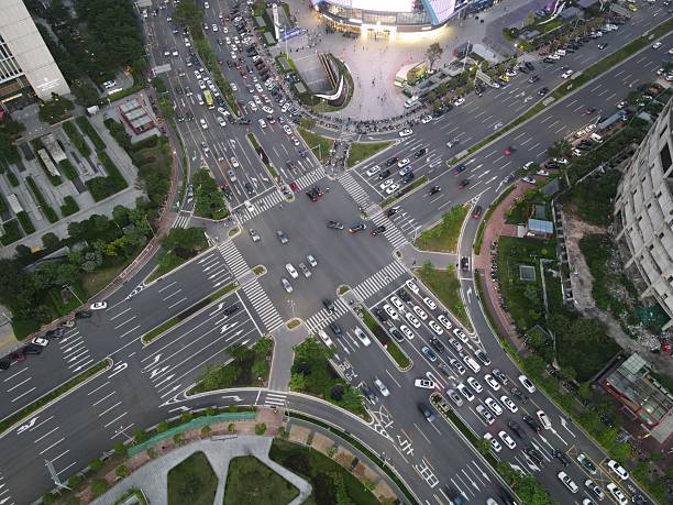 istock Busy traffic on crossroads on city evening 2232654389
