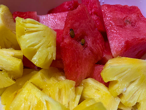 watermealons and pineapples chopped fruit close up shot