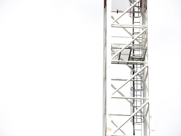 istock White Tower cranes , Tower Scaffold known for their high reach and large load capacity, isolated on white background. 2232655914