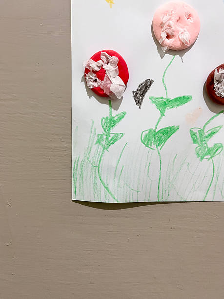 istock Handmade Children’s Artwork with Flowers and Clay 2232657326