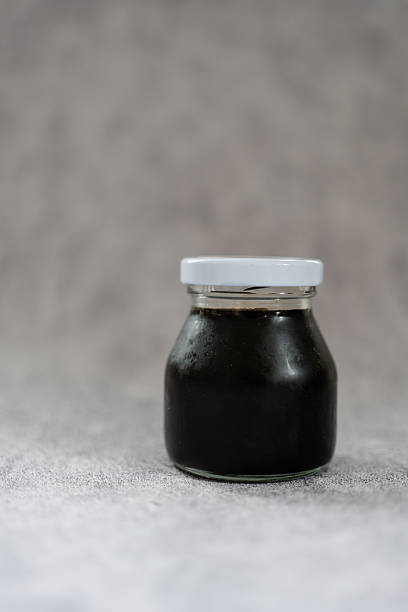 A mini glass of cold brew coffee