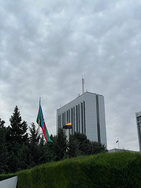 istock Azerbaijani Flag; Eternal Flame; and Modern Buildings. 2232660182