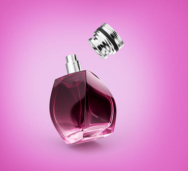 istock Pink Clear Glass Perfume Bottle Gleams With Luminous Light On Soft Pink Background 3D Illustration 2232661075