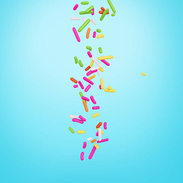 istock Colorful Sprinkles For Cakes And Bakery Items Falling From Top On cyan Background 3D Illustration 2232662206