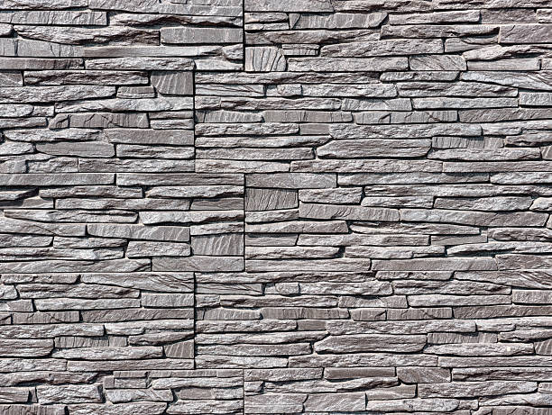 istock Stone Wall Texture - High-Resolution Grey Stone Background for Digital Wallpaper, Photography Backdrops, Web Design, Minimalist Creations, and Engaging Marketing Materials Across Industries 2232663250