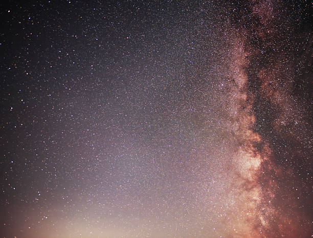 istock Beautiful bright Milky Way galaxy on the starry sky.  Night sky astronomical background. 2232667936