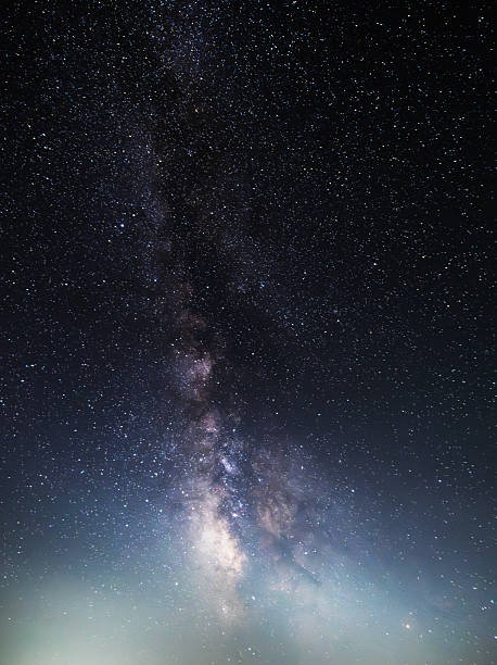 istock Beautiful bright Milky Way galaxy on the starry sky.  Night sky astronomical background. 2232668392