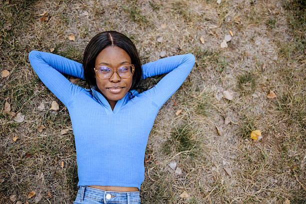 Relaxed woman resting on the grass