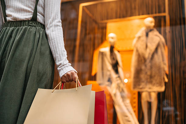 istock Hands holding shopping bags 2232671815