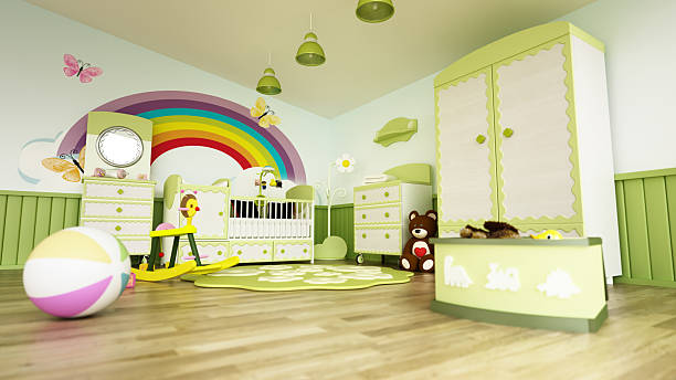 A colorful nursery features a rainbow mural, soft toys, and playful furniture. The cozy room is filled with light, perfect for creating a warm atmosphere for children.